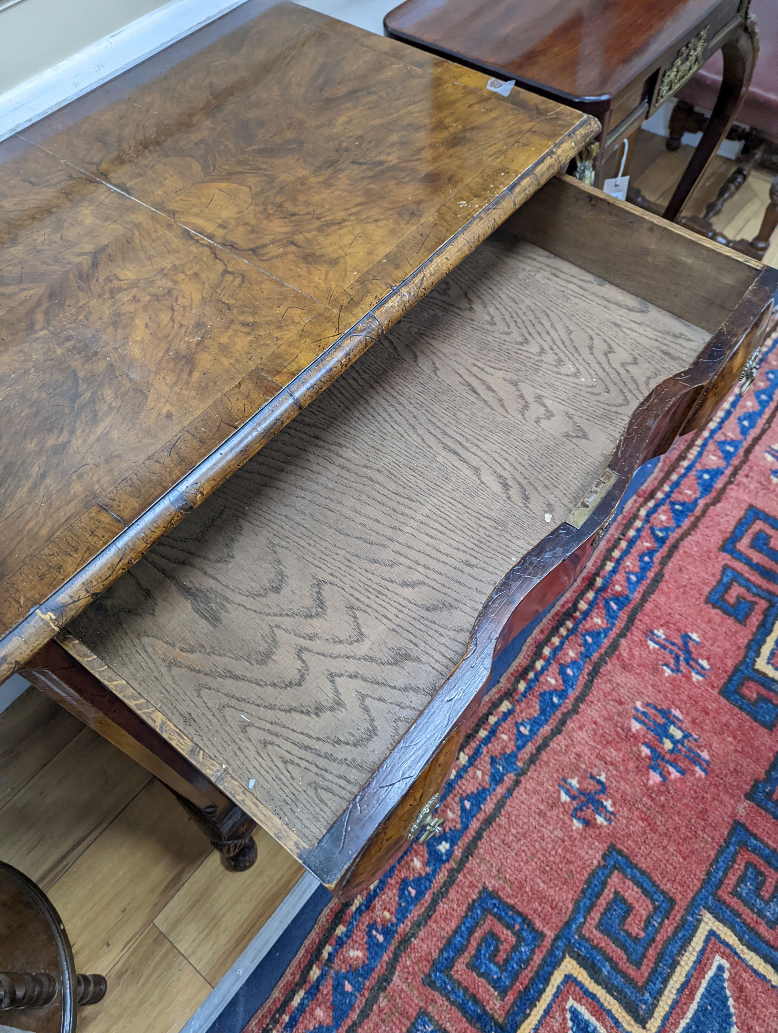 An early 20th century Queen Anne revival banded walnut shaped front chest, width 77cm, depth 46cm, height 85cm